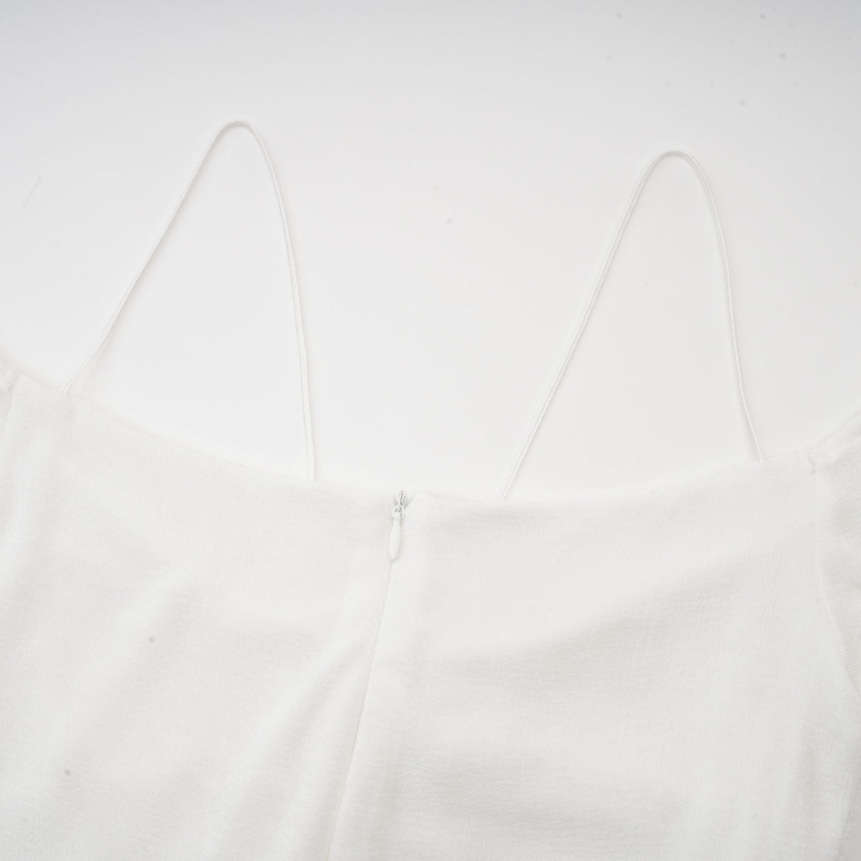 Aurohaya Noémie off-shoulder panelled maxi dress in White