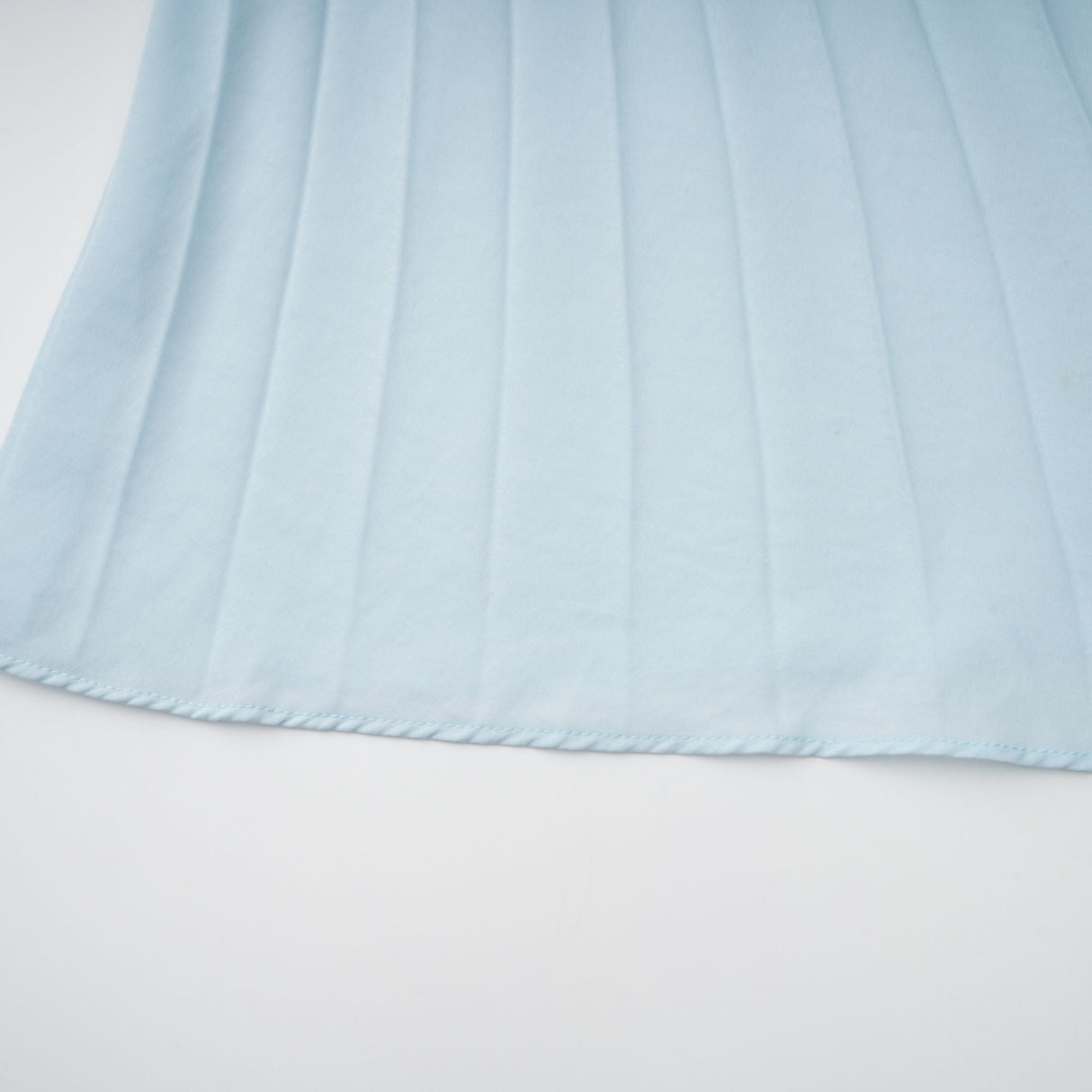 Aurohaya Andréa Blue Pleated Maxi Dress with Cutout Detail