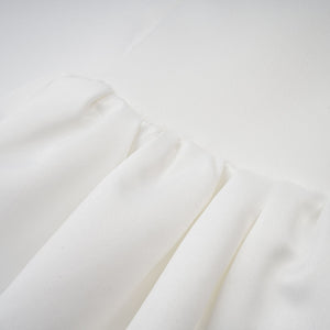 Aurohaya Aurélie white halterneck ruffled mini dress