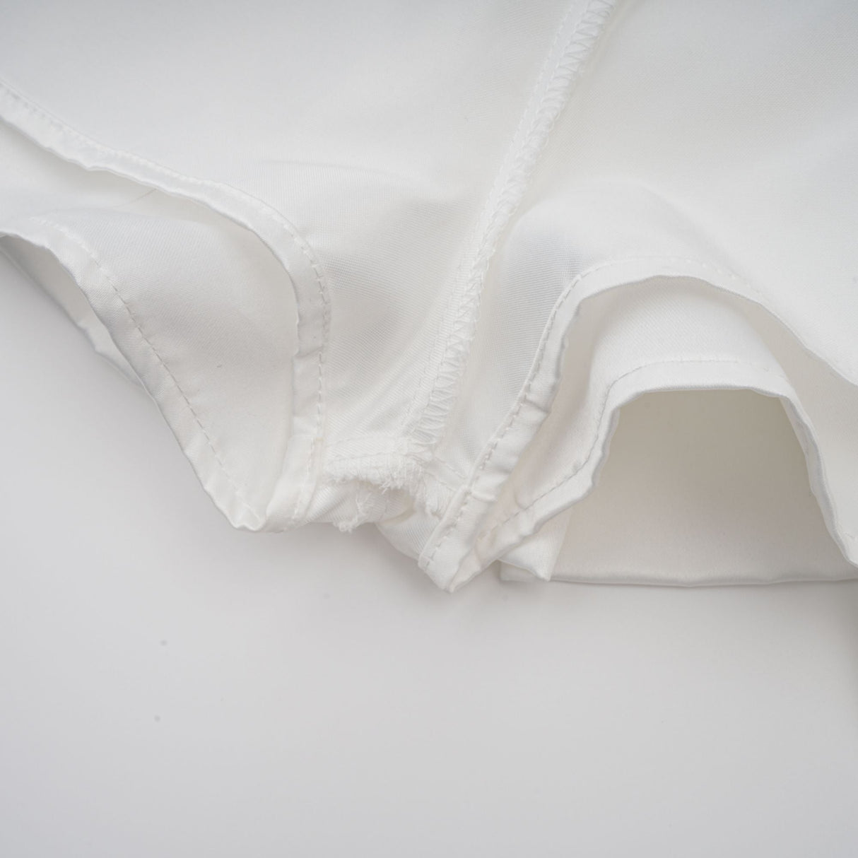 Aurohaya Aurélie white halterneck ruffled mini dress