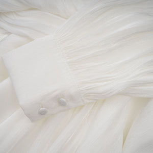 Aurohaya Mahault white pleated glitter-effect mini dress
