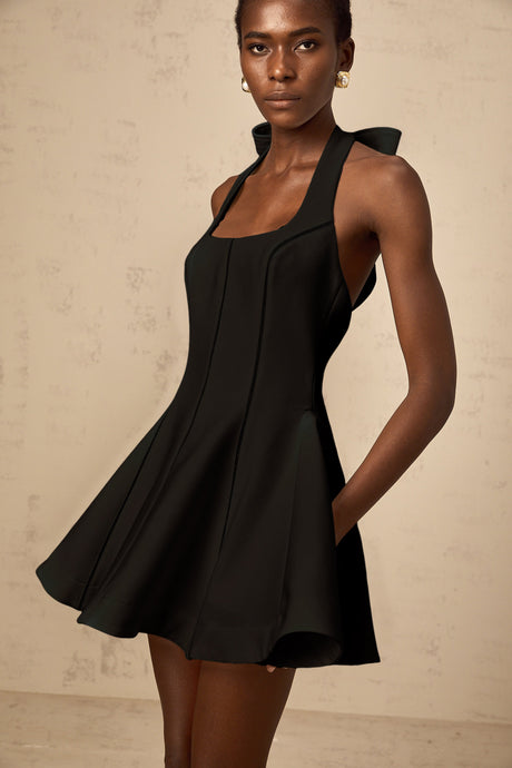 Aurohaya Quirine halterneck bow-detail mini dress in Black