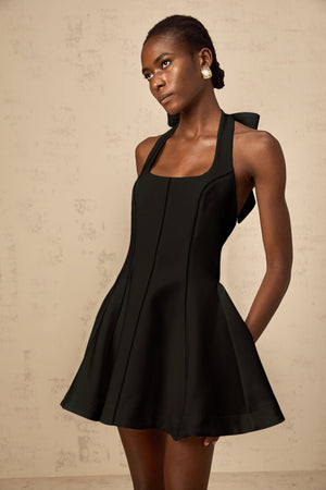 Aurohaya Quirine halterneck bow-detail mini dress in Black
