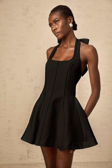 Aurohaya Quirine halterneck bow-detail mini dress in Black