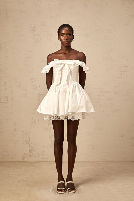 Aurohaya Arsène white oversize-bow ruffled mini dress